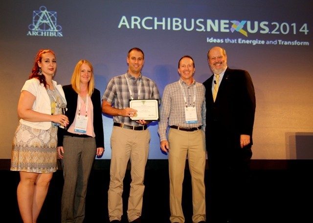 Horizant staff accepting Archibus Business Partner Community Excellence Award