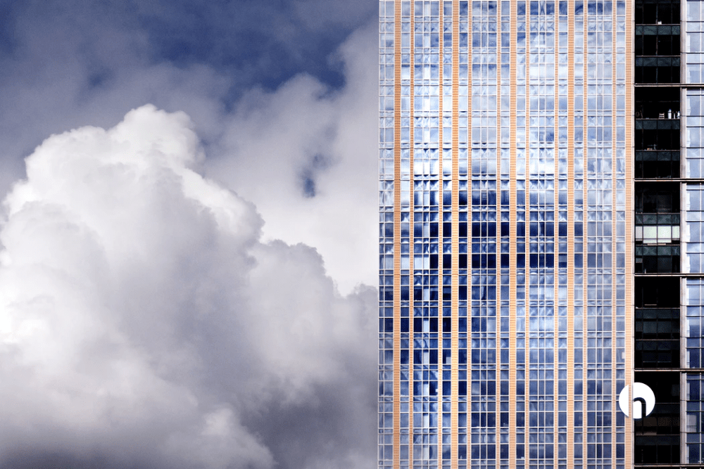 Glass building in the clouds